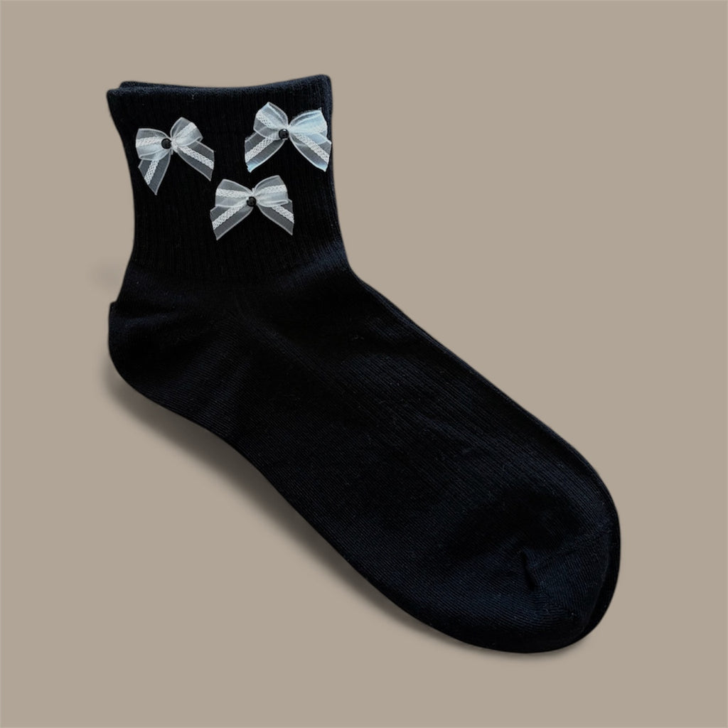 CALZINI NERI CON FIOCCO BIANCO