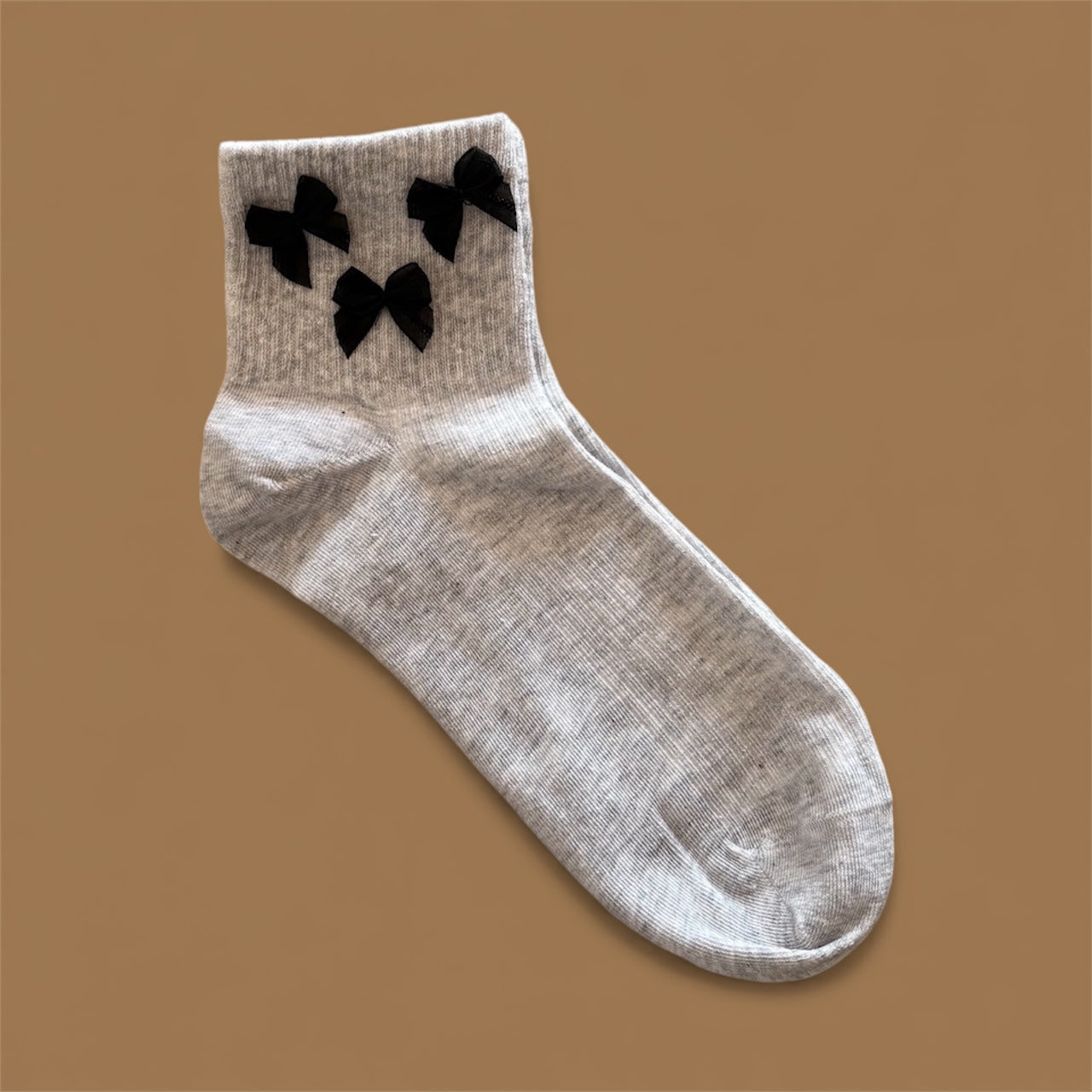 CALZINI GRIGI CON FIOCCHI