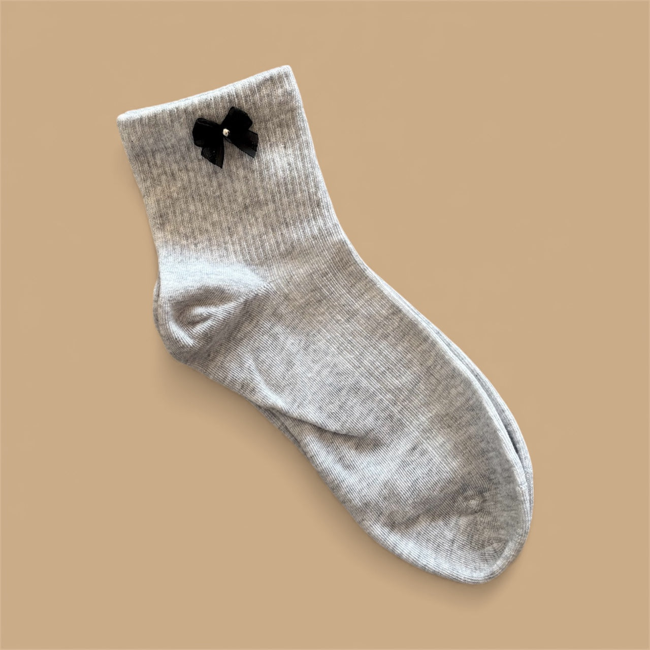 CALZINI GRIGI CON FIOCCO